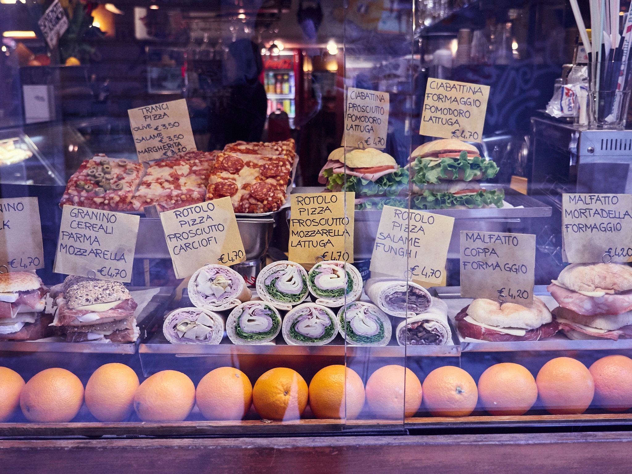 Assorted pastries arranged on a bakery counter